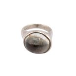 Elsa Peretti for Tiffany & Co, a silver and rock crystal oval cabochon ring, English post 2000 laser