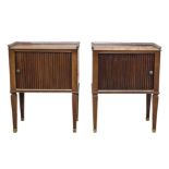 Pair of French Louis XVI style bedside tables with sliding tambour cupboard doors, raised on