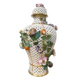 An exceptional large Meissen porcelain pot pourri pierced lattice-work urn with cover, with flower
