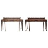Pair of large Irish Regency style mahogany console tables with raised gallery tops and reeded column