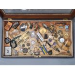 Pocket finds:- A 19thcentury bijouterie collector's display cabinet containing numerous curios and