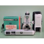 A rare Minox II subminiature "spy" camera. with original leather pouch, a Minox binocular attachment