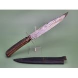 A 19th-century drop-point hunting knife with an antler handle in a sewn leather sheath. 30 cm