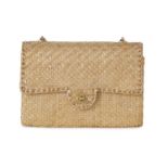 Chanel, a rare rattan Classic Single Flap handbag.