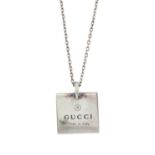 Gucci, a silver pendant necklace.