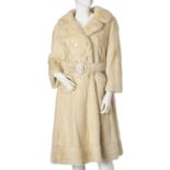 A full-length pearl mink fur coat.