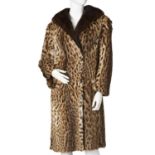 Mortons, an ocelot fur coat with mink fur trim.