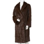 E.M.Wheeler, a full-length squirrel fur coat.