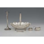 A mixed group, to include a George V silver cream jug, by C W Fletcher & Son Ltd (Charles William