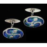 Archibald Knox for Liberty and Co., a pair of Arts and Crafts silver and enamelled cufflinks,