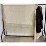 A large white fringed piano shawl, c.1900, with raised embroidery of Ancient Egyptian gods,