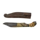 An antique Middle Eastern dagger, carved ivory hilt with chased white metal mounts, wooden scabbard,