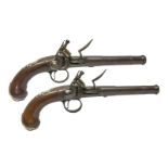 A Pair Of Silver-Mounted Queen Anne Flintlock Pistols By Wilson