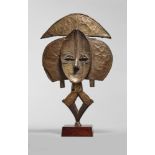 A 19th century Bakota reliquary gaurdian, With old collection number, in the hand of Charles Ratton