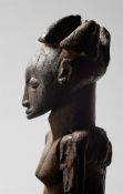 An important seated royal Hemba Singiti Figure