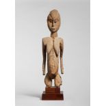 An old Lobi figure