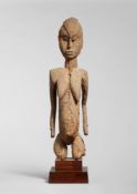 An old Lobi figure
