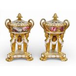 Coalport, C.1820. A Rare and Fine Pair of Tall Potpourri Urns with Covers. Early 19th Century. A