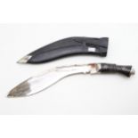 Nepalise Gurka Kukri knife in leather sheath, horn handle with brass inlay, 41cm.