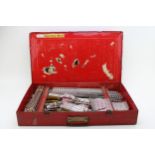 A Collection of Mid Century Meccano Pieces in an Original Red Tin, collection only. Very good