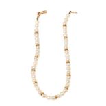 An 18ct gold and pearl bracelet set with 18ct gold clasp and thirteen spacers, pearls of well