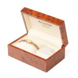 A lady's, Accurist 9ct gold cased cocktail watch, the signed oval champagne dial with baton
