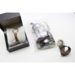 A Rotary wristwatch, the signed dial with Arabic numerals, a vintage Timex automatic wrist watch the