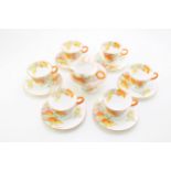 A Shelley Art Deco Regent shape 'Cape Gooseberry' pattern tea set comprising six cups and saucers,