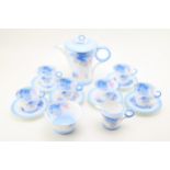 A Shelley 'Phlox' tea set, comprising six trios, six demi-tasse cups, sandwich / cake plate,