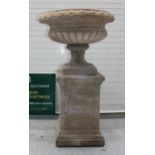 A large garden tazza urn and pedestal in reconstituted stone, 94cm tall, 57cm diameter. Frost