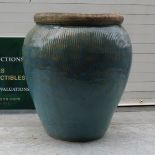 A large garden planter in blue and green glazed finish, 52cm tall, 39cm diameter. Frost hardened and