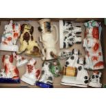 A collection of 19th century and later Staffordshire pottery, mostly King Charles Cavaliers, to