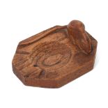 Workshop of Robert 'Mouseman' Thompson of Kilburn Yorkshire, a carved octagonal oak ashtray with