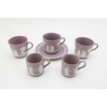 Wedgwood Lilac Jasperware to include a cup and saucer with two spare cups and two coffee cans (6).