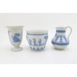 Wedgwood Blue on White Jasperware to include a jardiniere, 11cm tall, with a vase, 13.5cm tall and a