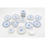 A collection of Wedgwood Blue on White Jasperware to include a lidded jar, pin dishes, ash trays and