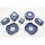 Wedgwood Cobalt Blue Jasperware five lidded trinket boxes, largest 10.5cm wide, with a pair of
