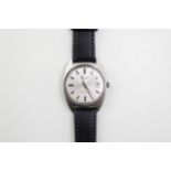 A Garrard Automatic 25 gentleman's wristwatch, circular silver-tone dial, applied baton hour