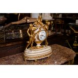 A FRENCH ORMOLU AND MARBLE STRIKING MANTEL CLOCK