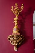 Gilt Floral wall statue (Attached to wall- buyer may require specalist equipment to remove)