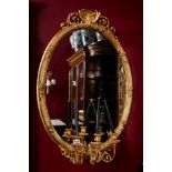 Gilt Mirror, with candle holder. (attached to wall)