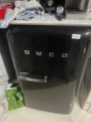 Smeg Fridge (Contains expired items buyer required to dispose of).