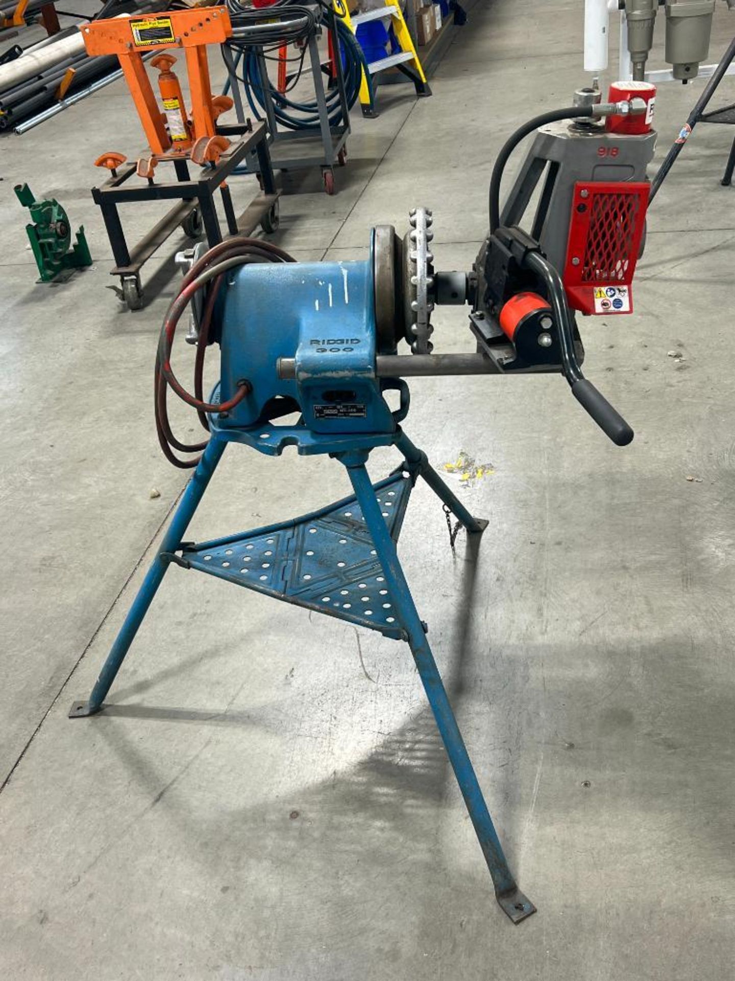 Ridgid 300 pipe threading machine on tri-stand.