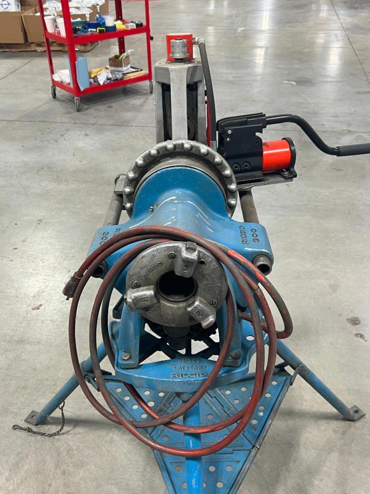 Ridgid 300 pipe threading machine on tri-stand.