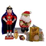 13pc Christmas Grouping Including Macy's Superhero Nutcracker and Sitting Santa Decoration