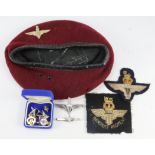 Para 1965 dated beret with various para badges etc. Some light mothing to the top.