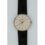 IWC Portofino, stainless steel, ref. R1210, circa 1962. The silvered dial with baton indices,