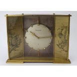 Jaeger-LeCoultre Gilded Brass Desk Clock (Circa 1965). Triptych-style case, decorated on each side
