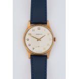 Garrard, 9ct yellow gold, circa 1970s. The silvered dial with Arabic numerals, subsidiary seconds,