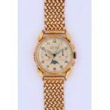 Angelus Chronograph, 18ct yellow gold, circa 1940s. The silvered dial with Arabic numerals, twin